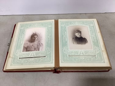 Vintage scrapbook with photographs inside