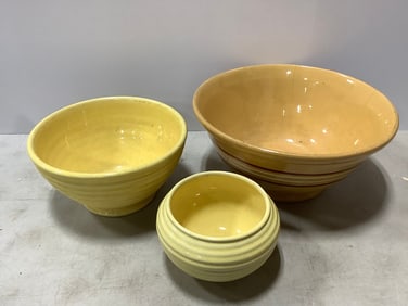 Yellowware bowls(largest 14in.across, 6.5in.tall)