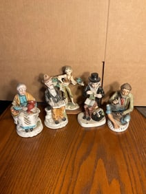 Vintage ceramic statues with paper labels 7in tall