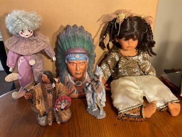 Early ceramic indian statues, porcelain clown and more