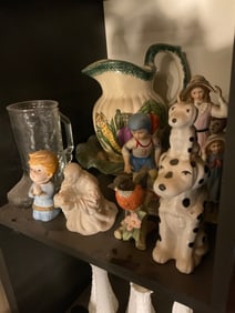 Ceramic pitchers, dogs and more