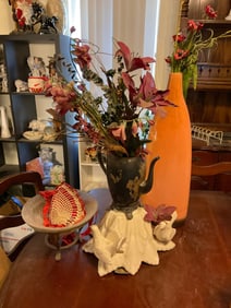 orange vase and silver plate and planter
