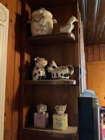 Contents of shelf with cows