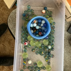 large lot of vintage marbles with shooters
