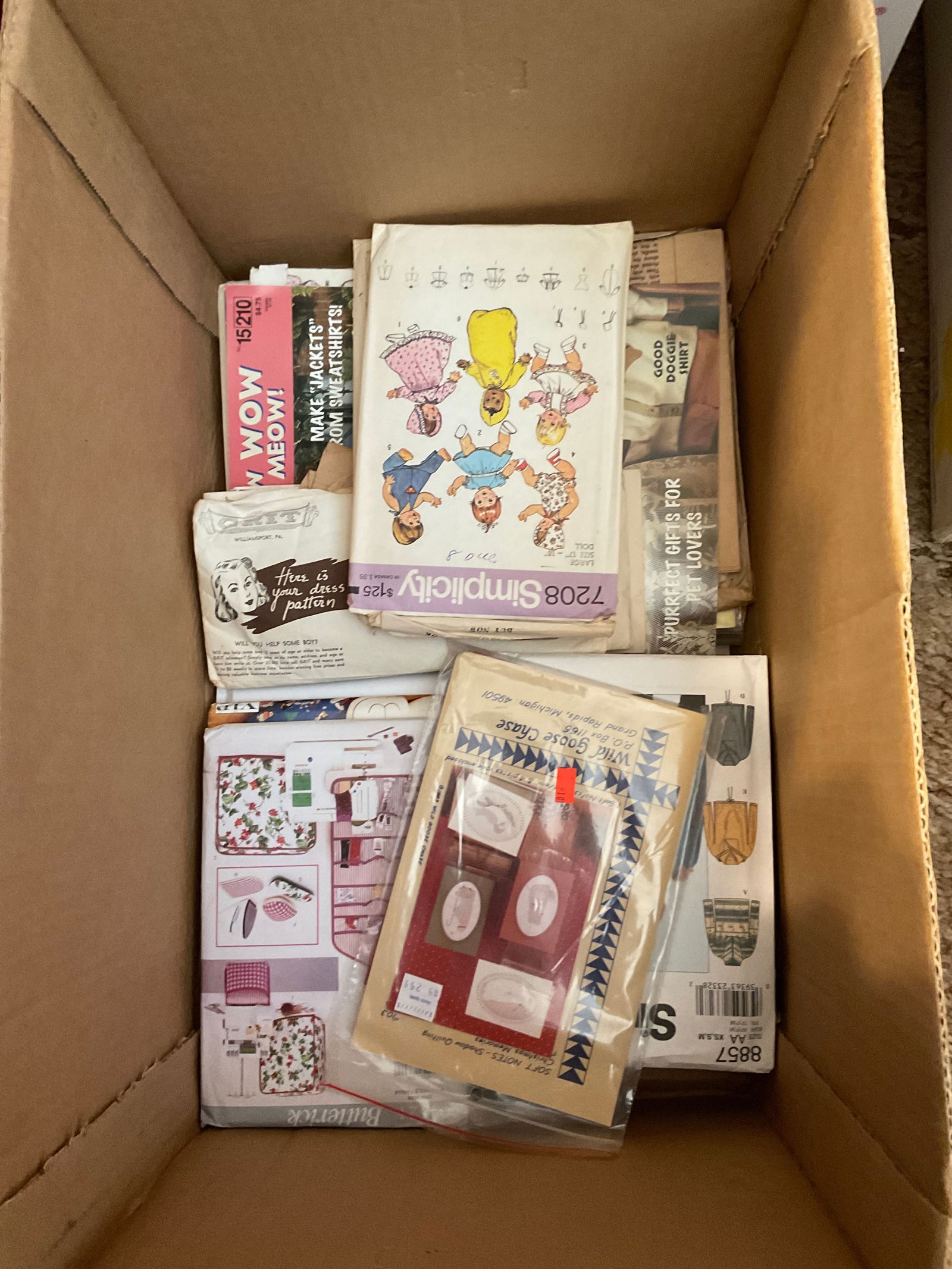 box full of vintage sewing patterns (1 of 1)