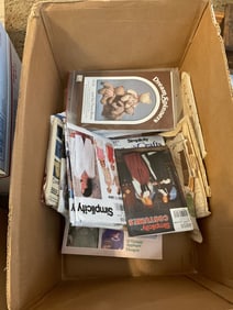 box full of vintage sewing patterns