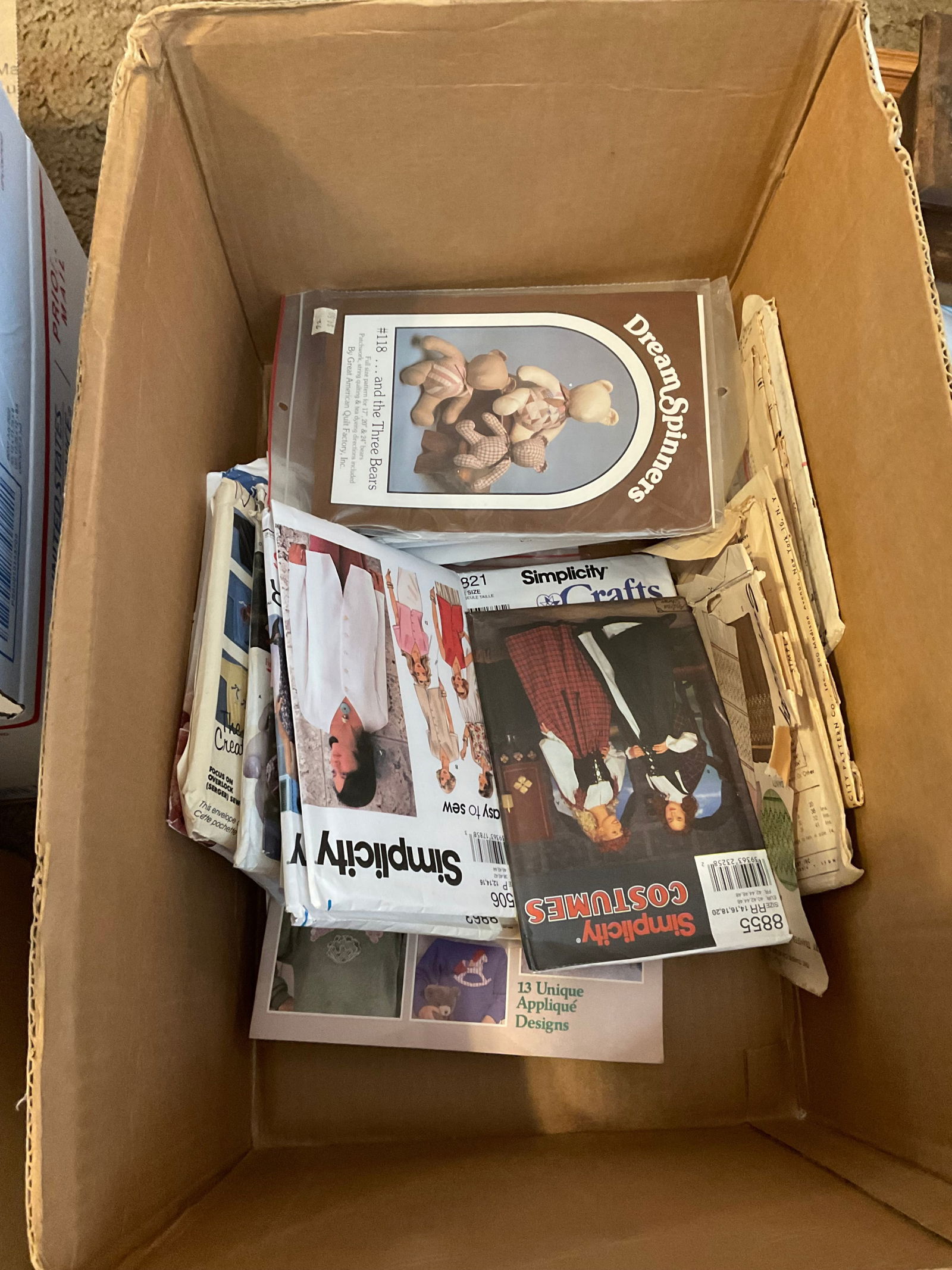 box full of vintage sewing patterns (1 of 1)