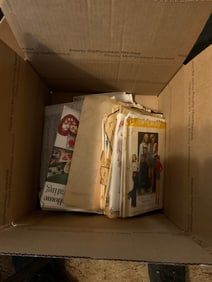 box full of vintage sewing patterns
