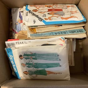 box full of vintage sewing patterns