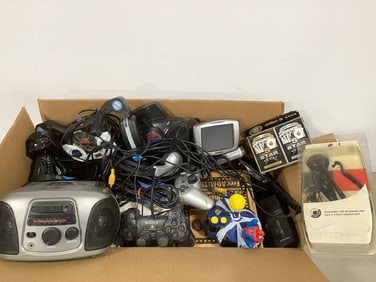 Radio casette player, various game controllers, Star Wars bobblehead, and more