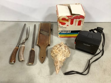 Polaroid Instant Land camera, wood plane, sheel decor, and more