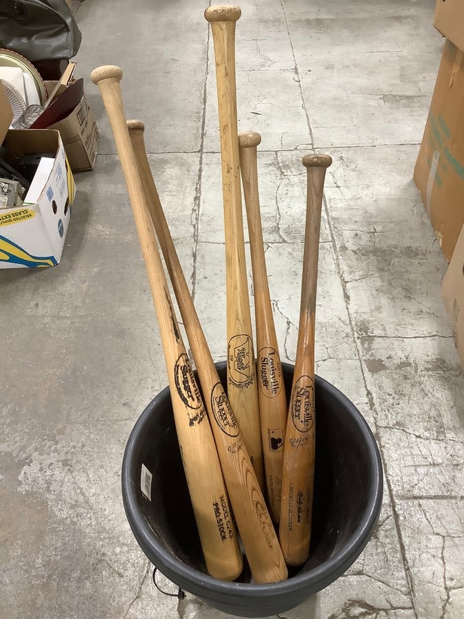 Wooden Louisville Slugger bats and outdoor planter: Wooden Louisville Slugger bats and outdoor planter