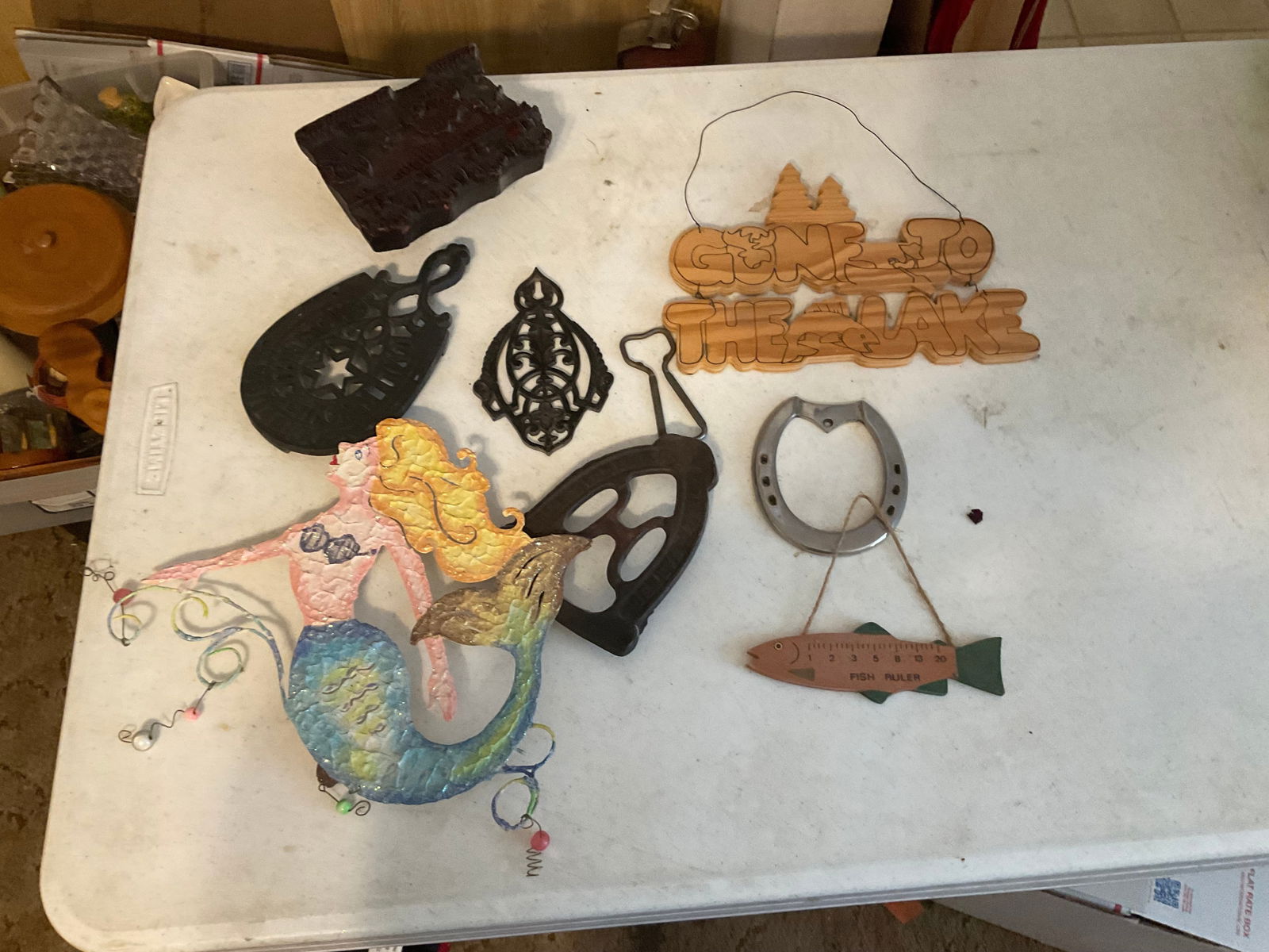 lot of cast iron trivets and more: lot of cast iron trivets and more