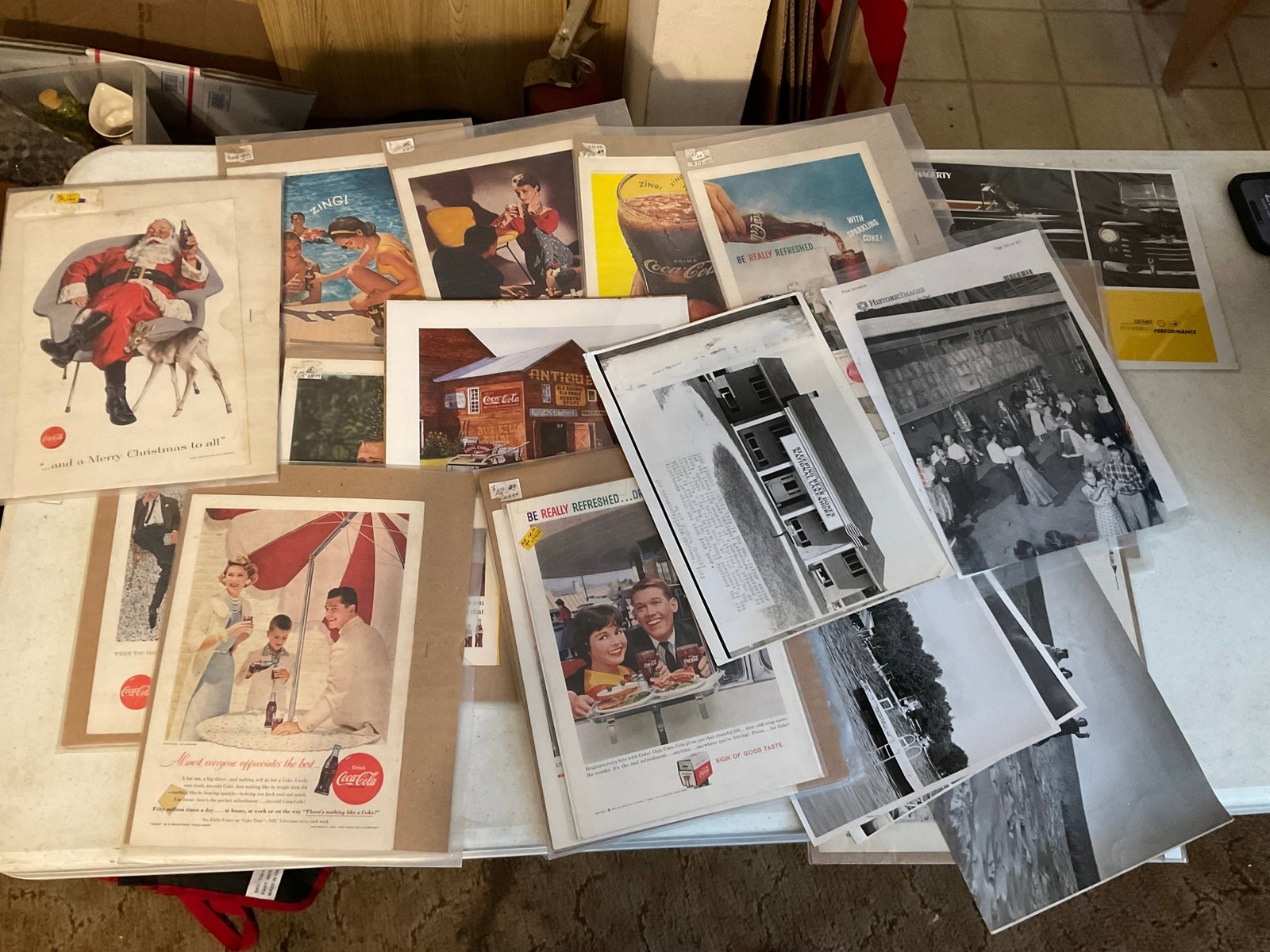 Lot of vintage Coca Cola advertising and black and white photos: Lot of vintage Coca Cola advertising and black and white photos