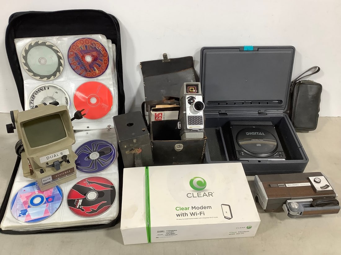 Bell & Howell vintage cameras, Dual 8 Baia Reviewer, CD player, various CD's, and more (1 of 1)