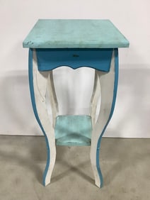 Small wooden table(27.5in.tall)