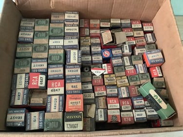 Box full of vintage electron tubes