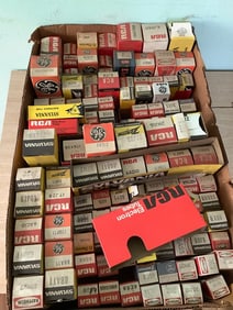 Box full of vintage electron tubes