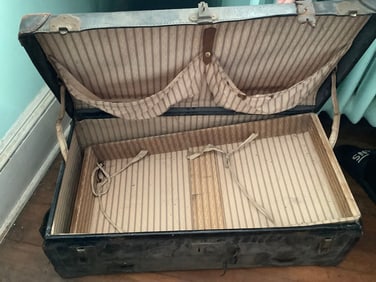 Vintage travel case with stickers from various places(28in.x19in.x5in.)