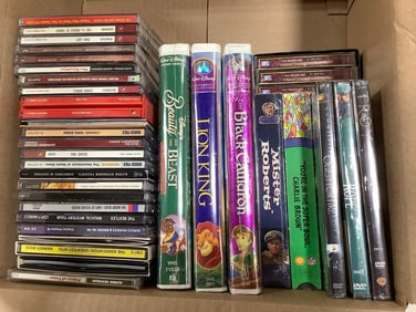 Disney VHS tapes(some sealed), sealed DVD's, CD's, and more