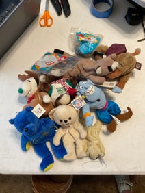 lot of beanie babies and other plushies