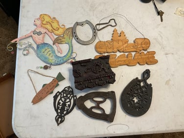 lot of cast iron trivets and more