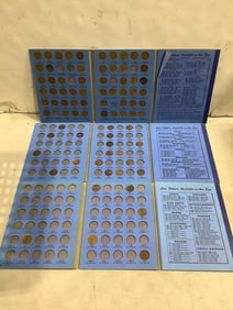 Vintage coin folders with coins
