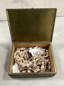 Tin container full of seashell necklaces(7in.x5.5in.x2.5in.)