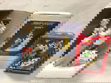 Snow White and Dopey/Cinderella and Prince Charming Disney statues and Looney Tunes ornament