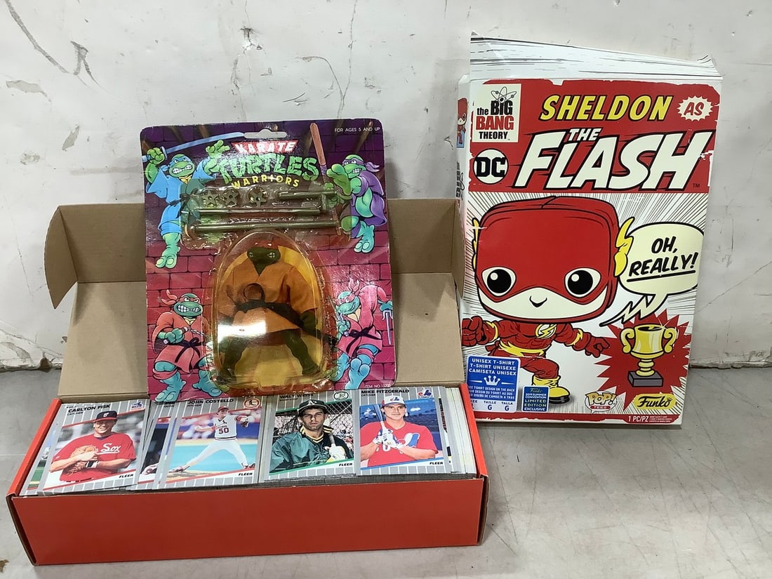 Karate Turtles Warriors collectible figure, Fleer baseball cards, and Sheldon the Flash tshirt(in: Karate Turtles Warriors collectible figure, Fleer baseball cards, and Sheldon the Flash tshirt(in box)