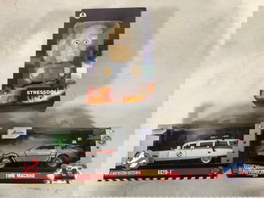 Ghostbusters Ecto-1, Back to the Future II Time Machine, and Back to the Future stress doll(all