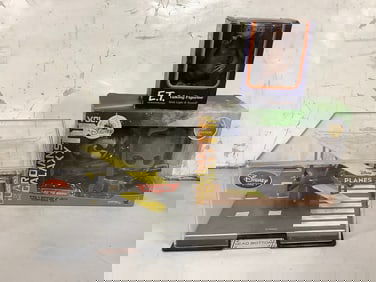 Disney Planes lead bottom airplane in case, E.T. talking figurine, and Guardians of the Galaxy