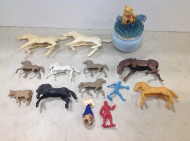 Vintage toy horses, candle, and more