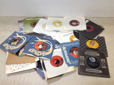 Various 45s (Jackie Wilson, Adam Wade, The Vogues, and more)