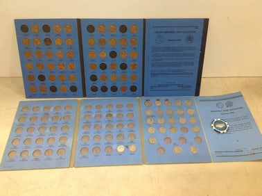Coin collection booklets(with some coins inside)