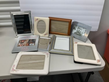 lot of various size picture frames