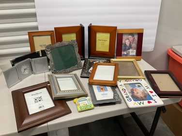 lot of various size picture frames