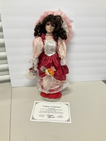 porcelain doll with COA