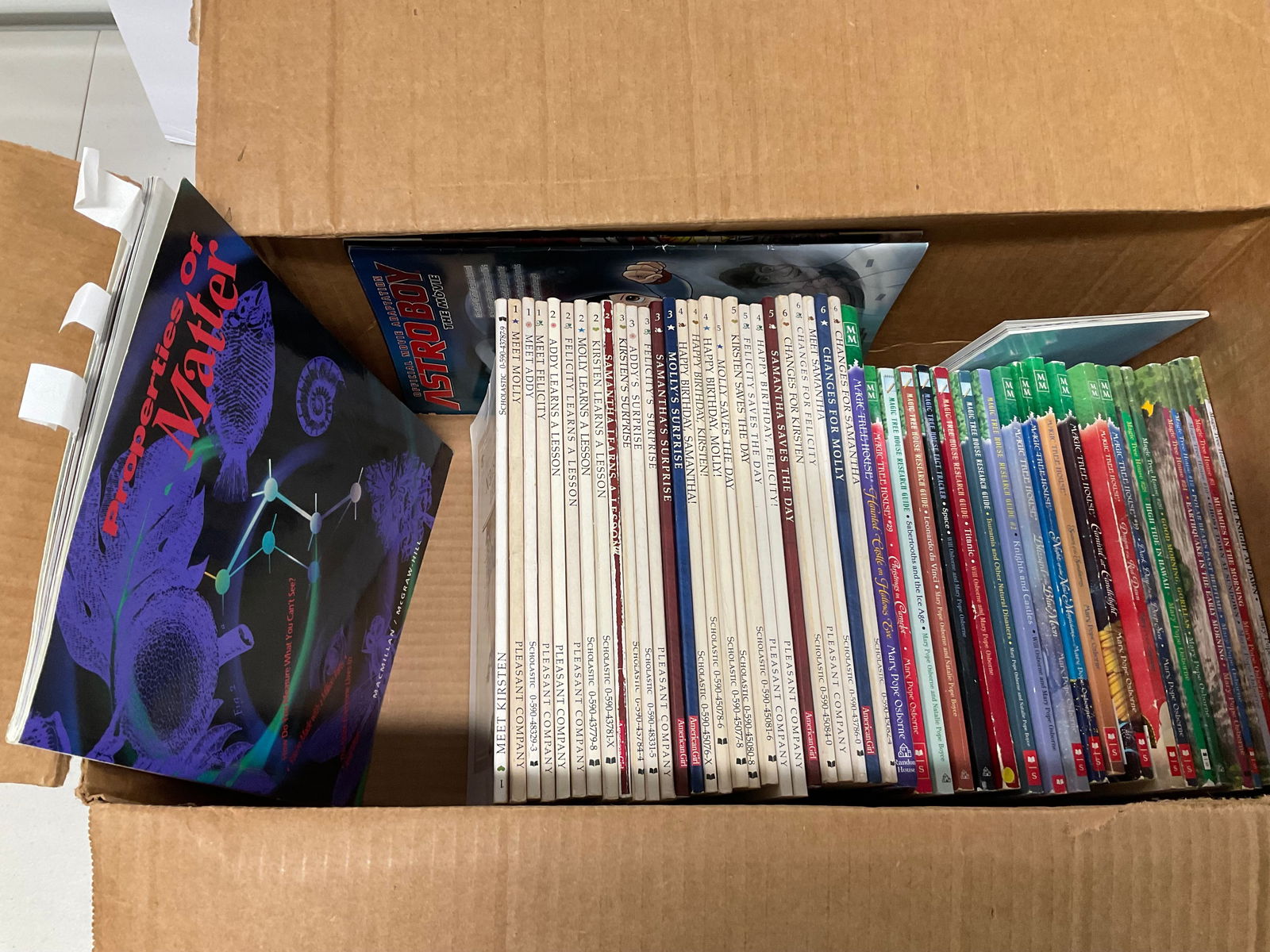 large amount of children's magic tree house and other books (1 of 1)
