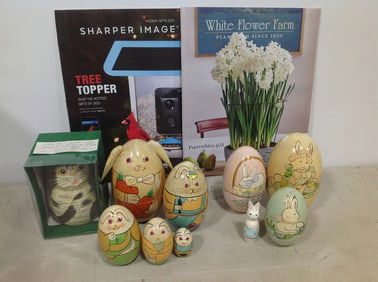 Magazines and various wooden nesting dolls