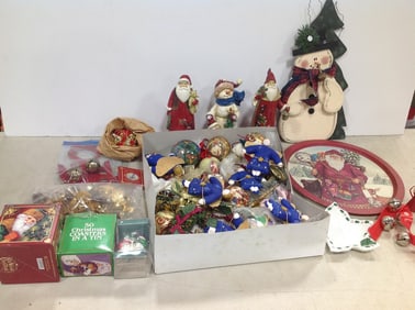 Various christmas ornaments, statues, Christmas coasters, and more