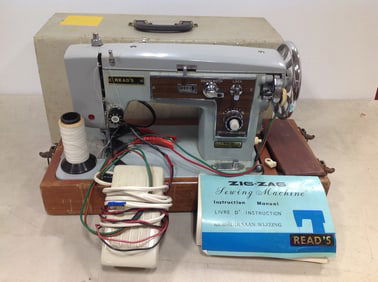 Reads 12V D.C. sewing machine with manual
