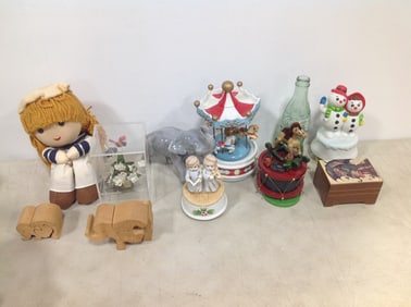 Vintage musical boxes(carousel, snowmen, etc.), wooden animals, ceramic elephant, and more