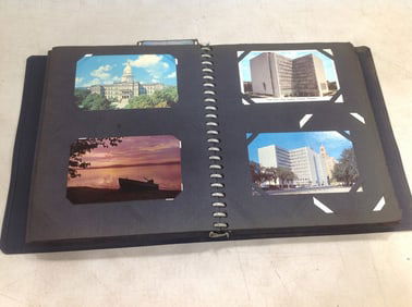 Vintage postcard album full of postcards