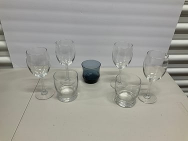 lot of stemmed clear glassware and more