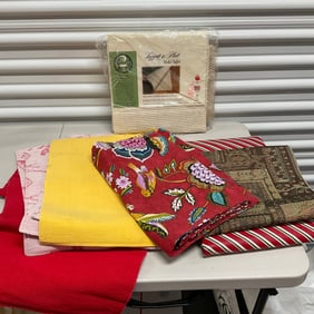 lot of tablecloths, placemats and more