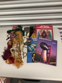 lot of art books, curtains hangers and more