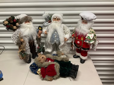 Lot of 4 Santa Claus figures 14in tall