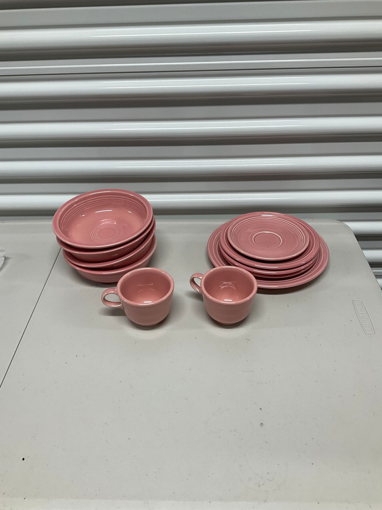 Lot of Fiestaware plates, bowls and cups: Lot of Fiestaware plates, bowls and cups