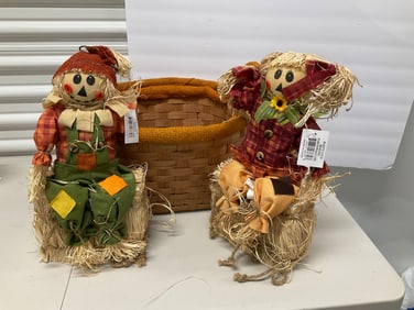 lot of autumn scarecrows, baskets and more